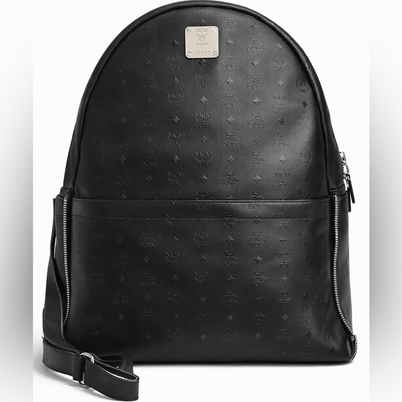 MCM Handbags - MCM Black Monogram Backpack Logo Plaque Zip Pocket Leather Good Condition